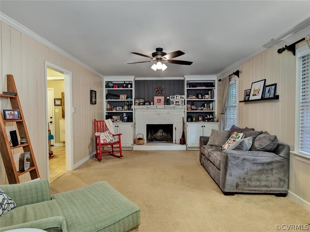 13631 Castleway Road Midlothian, VA 23114 - Photo 5 of 37 Family room has wood burning fireplace with brick