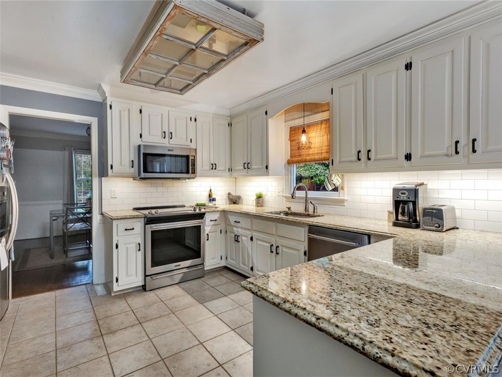 13631 Castleway Road Midlothian, VA 23114 - Photo 8 of 37 Updated kitchen with classic white cabinetry (real