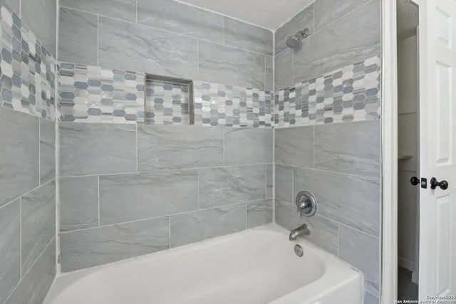 a bathroom with a bathtub