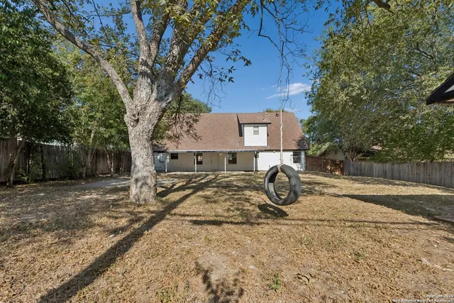 a view of street with parked cars