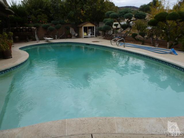 917 Appleton Road Simi Valley, CA 93065 - Photo 14 of 14 swimming pool view with plants and large trees