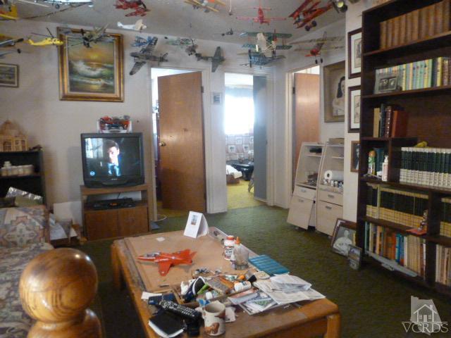 917 Appleton Road Simi Valley, CA 93065 - Photo 10 of 14 a living room with furniture and a flat screen tv