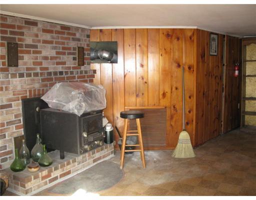 67 Roberts Ridge Road Waterboro, ME 04030 - Photo 20 of 25 Other. Woodstove in basement