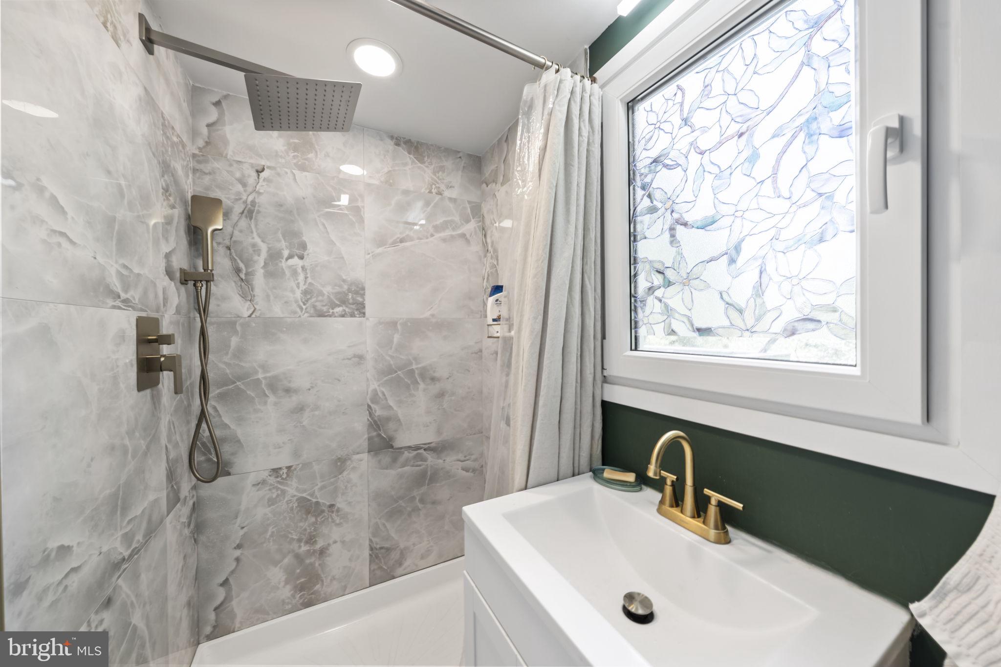 2549 Church Road Glenside, PA 19038 - Photo 20 of 40 Elegant marble shower retreat.