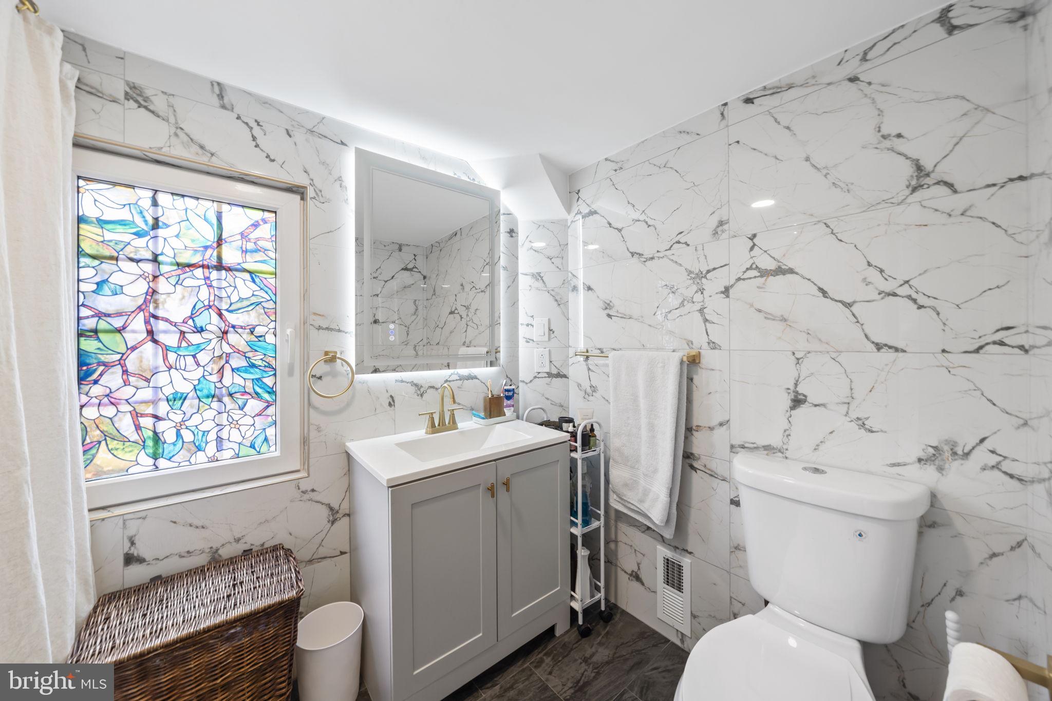2549 Church Road Glenside, PA 19038 - Photo 29 of 40 Elegant bathroom with stained glass charm.