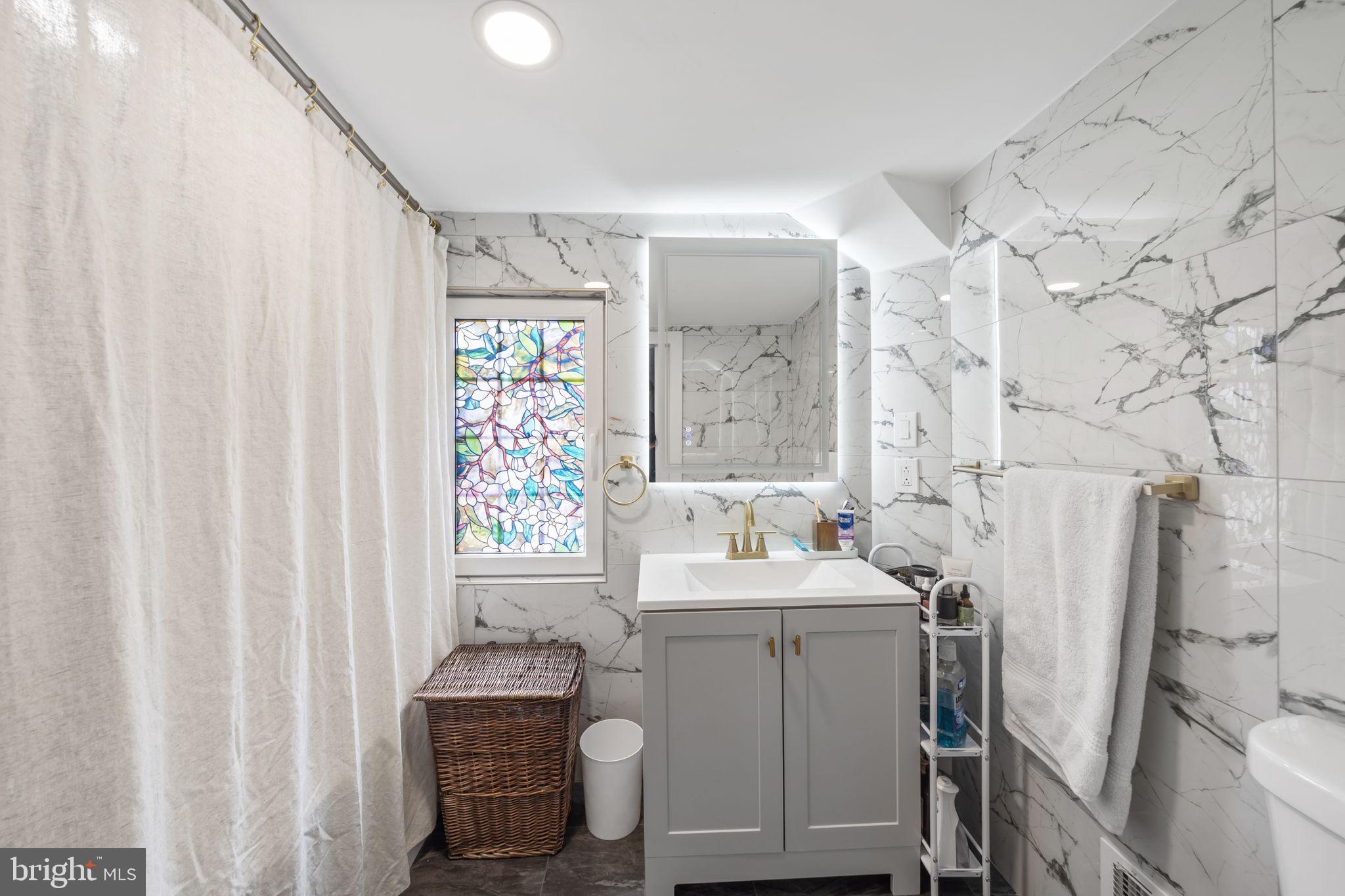 2549 Church Road Glenside, PA 19038 - Photo 30 of 40 Elegant marble bathroom retreat.