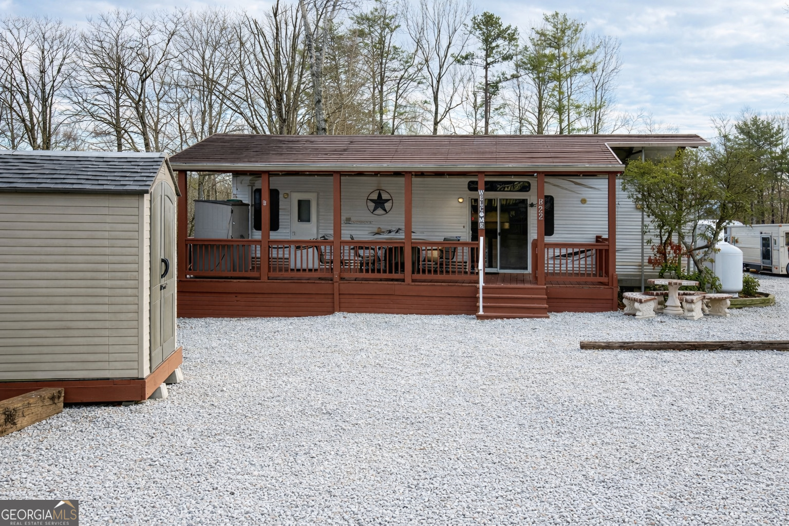 4 Evergreen Trail, Unit B22 Cleveland, GA 30528 - Photo 1 of 33 a front view of a house having patio