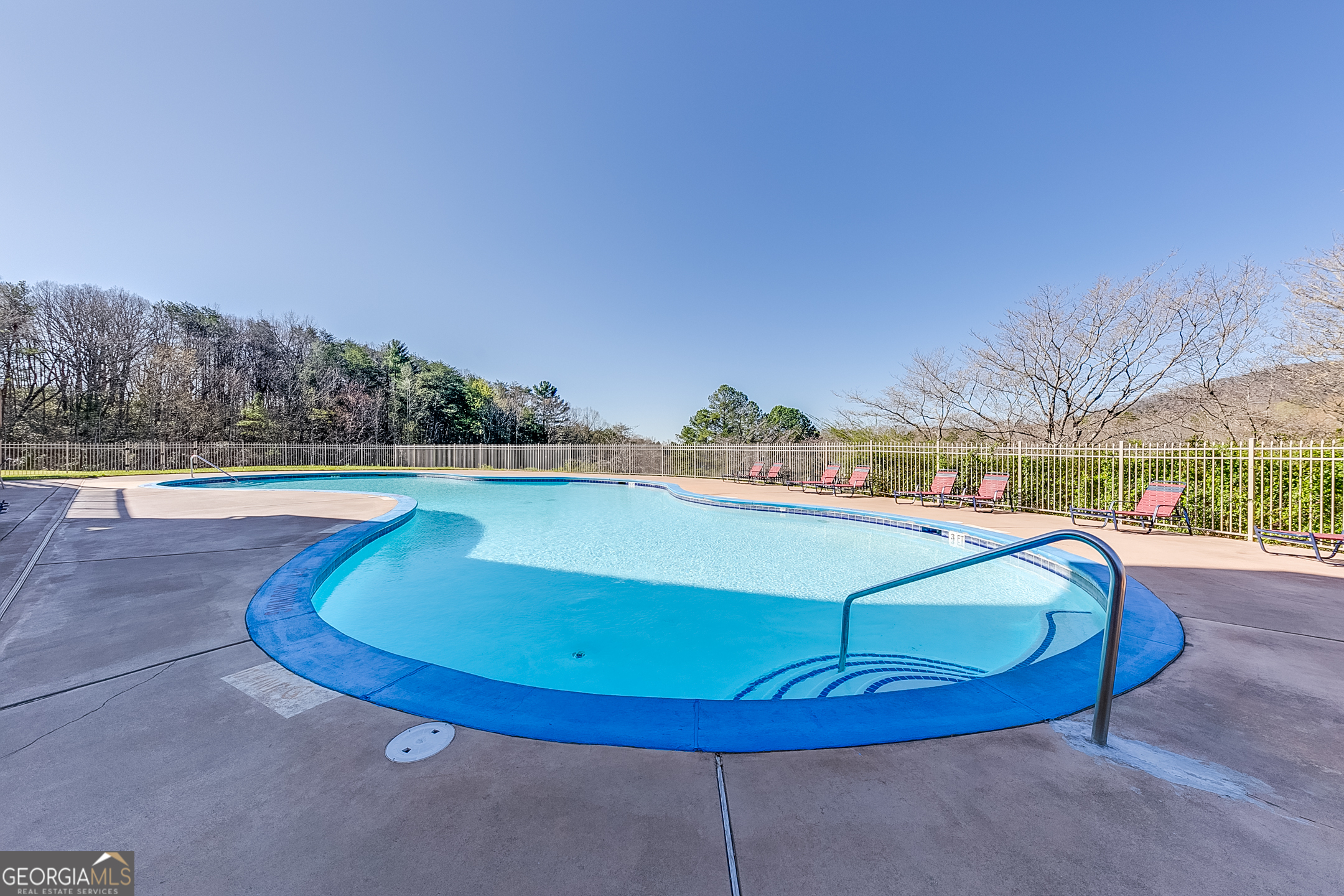 4 Evergreen Trail, Unit B22 Cleveland, GA 30528 - Photo 26 of 33 a view of a swimming pool with an outdoor space and seating area