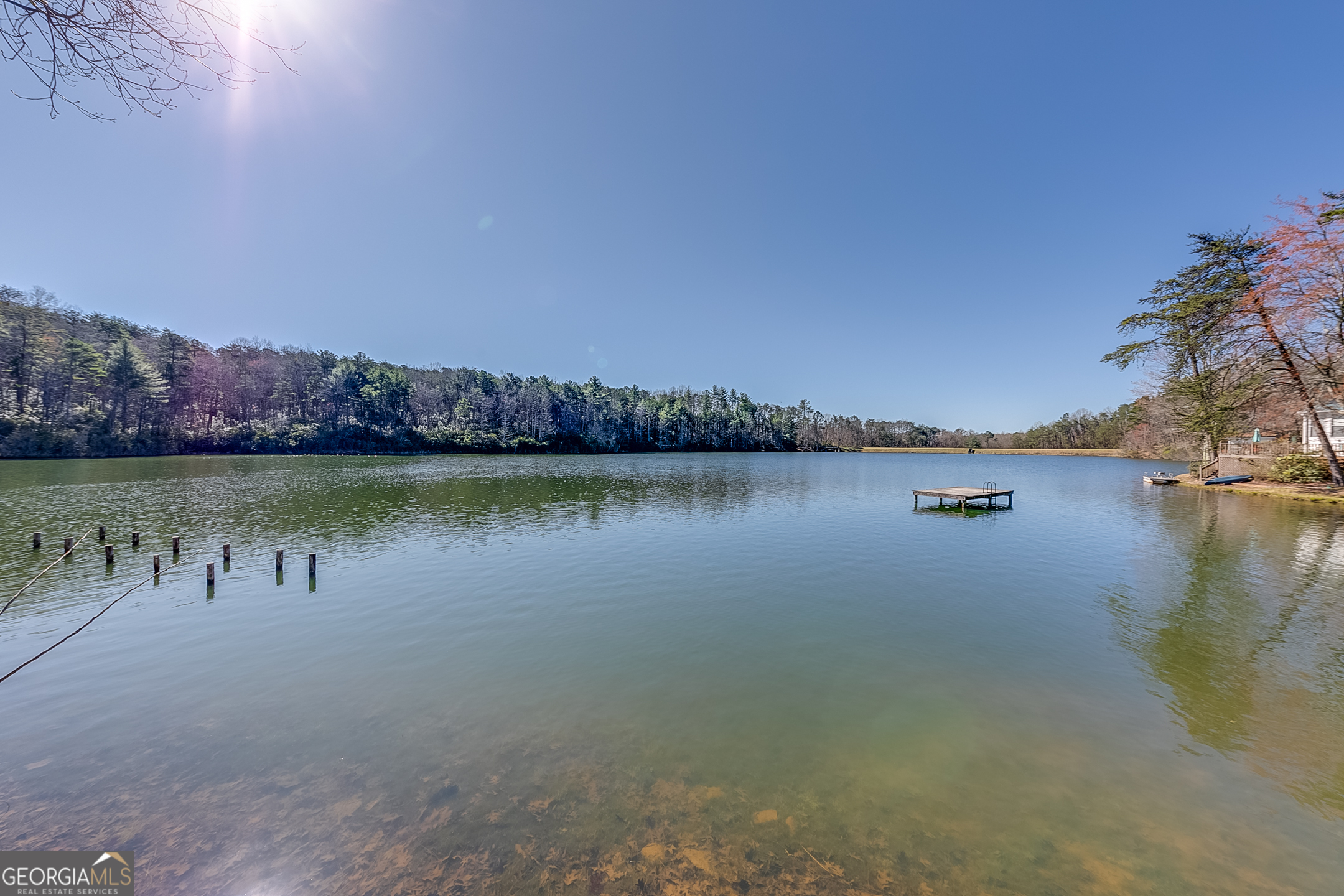 4 Evergreen Trail, Unit B22 Cleveland, GA 30528 - Photo 31 of 33 a view of a lake with houses in the background