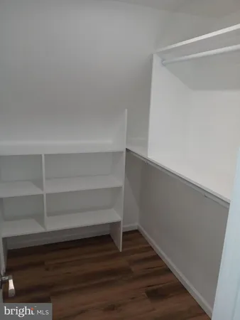 a view of a room that has a window in it