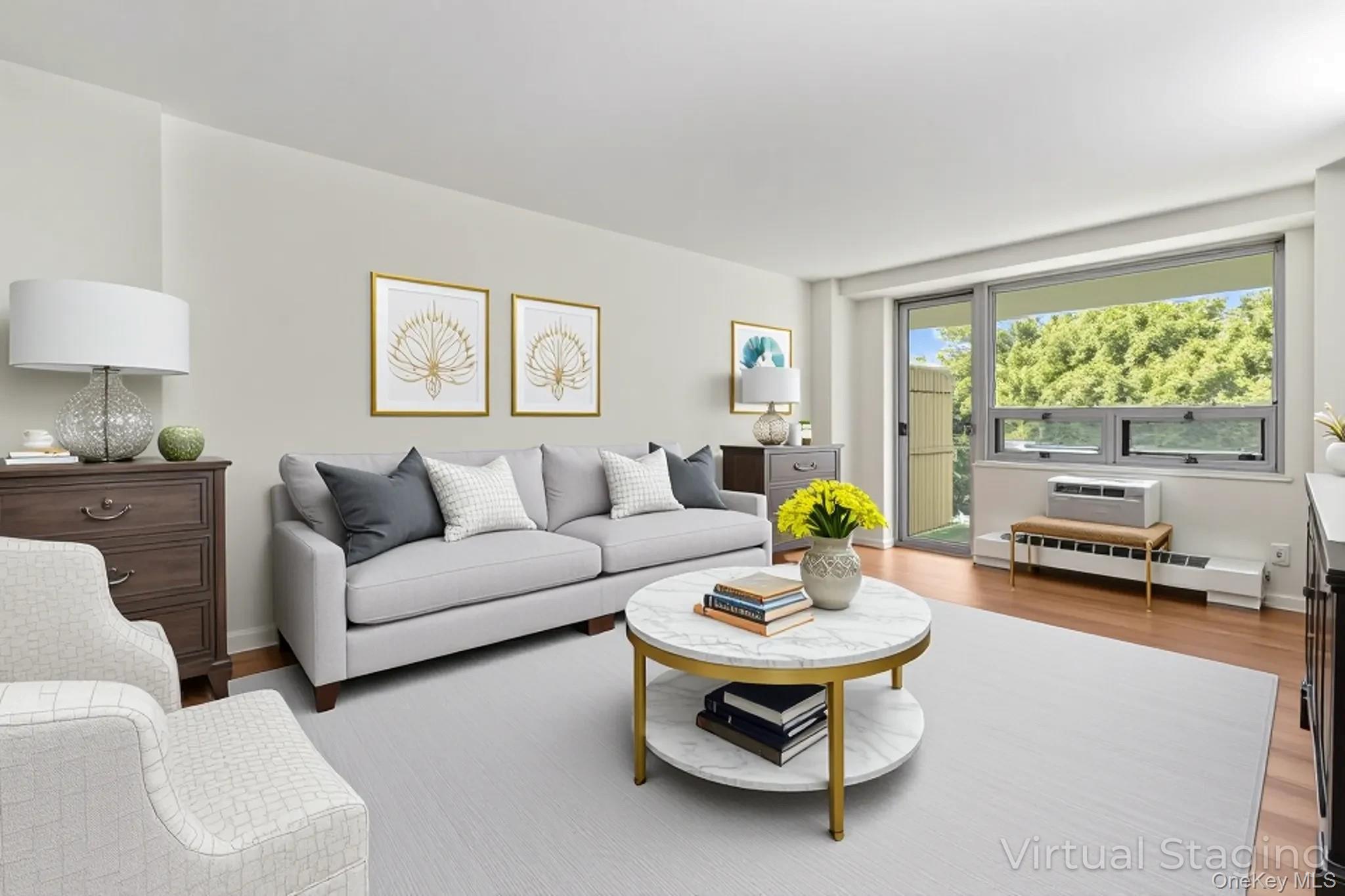 61-15 97th Street, Unit 2D Queens, NY 11374 - Photo 9 of 11 a living room with furniture and a table