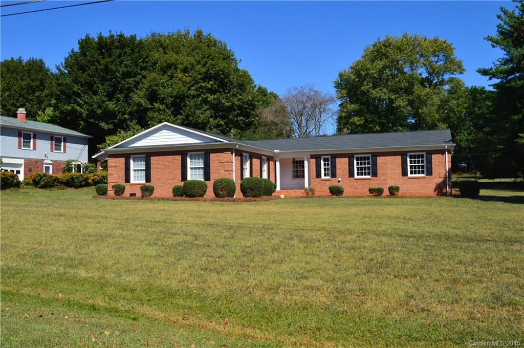 217 Museum Road Statesville, NC 28625 - Photo 2 of 19 a front view of a house with a garden