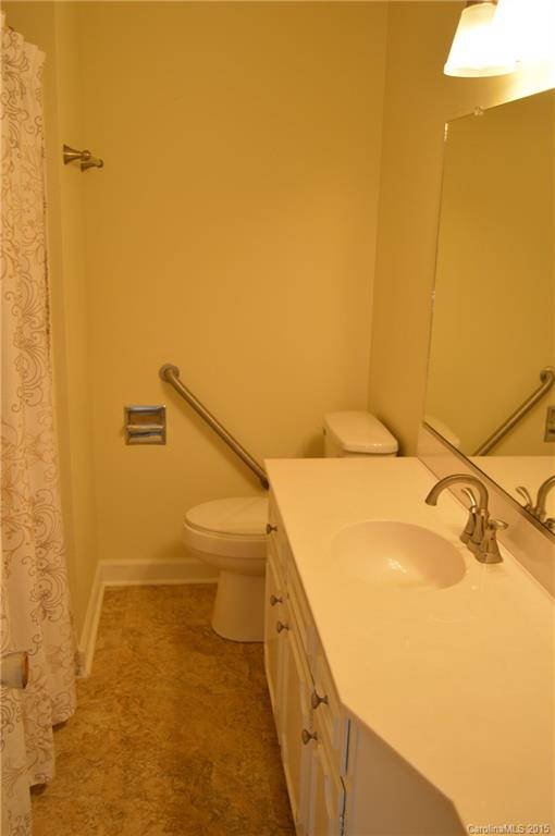 217 Museum Road Statesville, NC 28625 - Photo 15 of 19 a bathroom with a sink and shower