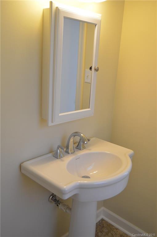 217 Museum Road Statesville, NC 28625 - Photo 19 of 19 a bathroom with a sink and a mirror
