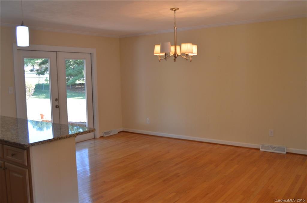 217 Museum Road Statesville, NC 28625 - Photo 9 of 19 a view of an empty room with a window