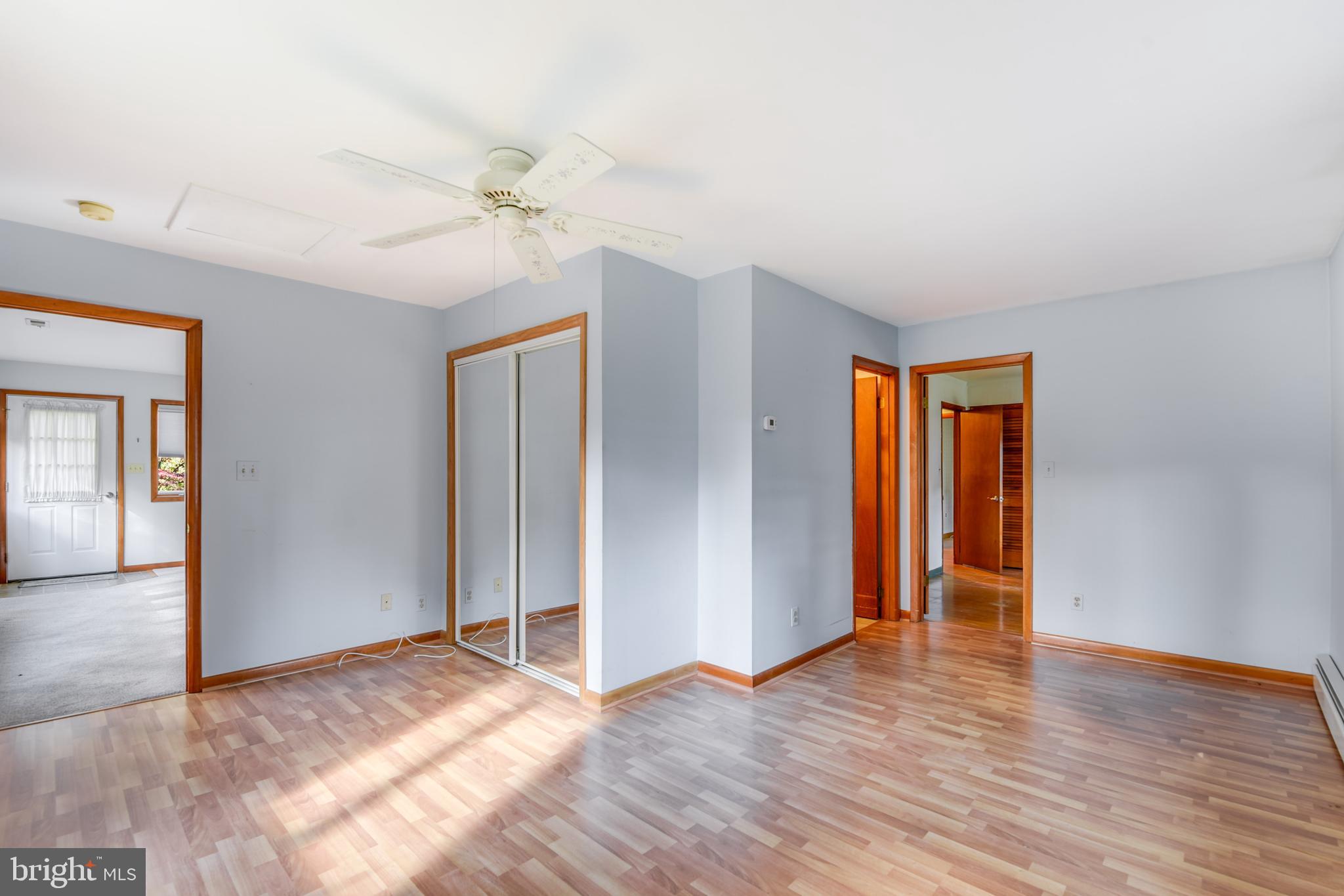 455 Community Road Severna Park, MD 21146 - Photo 25 of 51 a view of an empty room with window and wooden floor