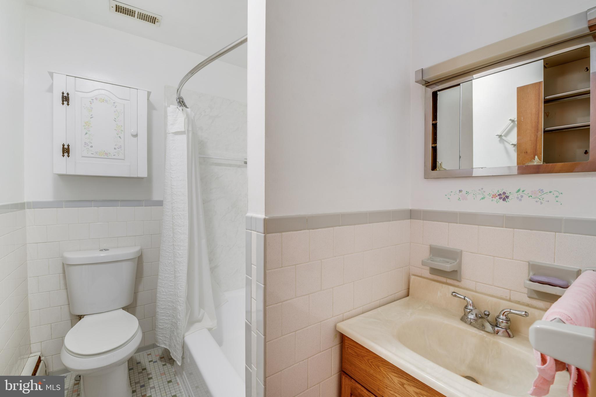 455 Community Road Severna Park, MD 21146 - Photo 26 of 51 a bathroom with a sink toilet and shower