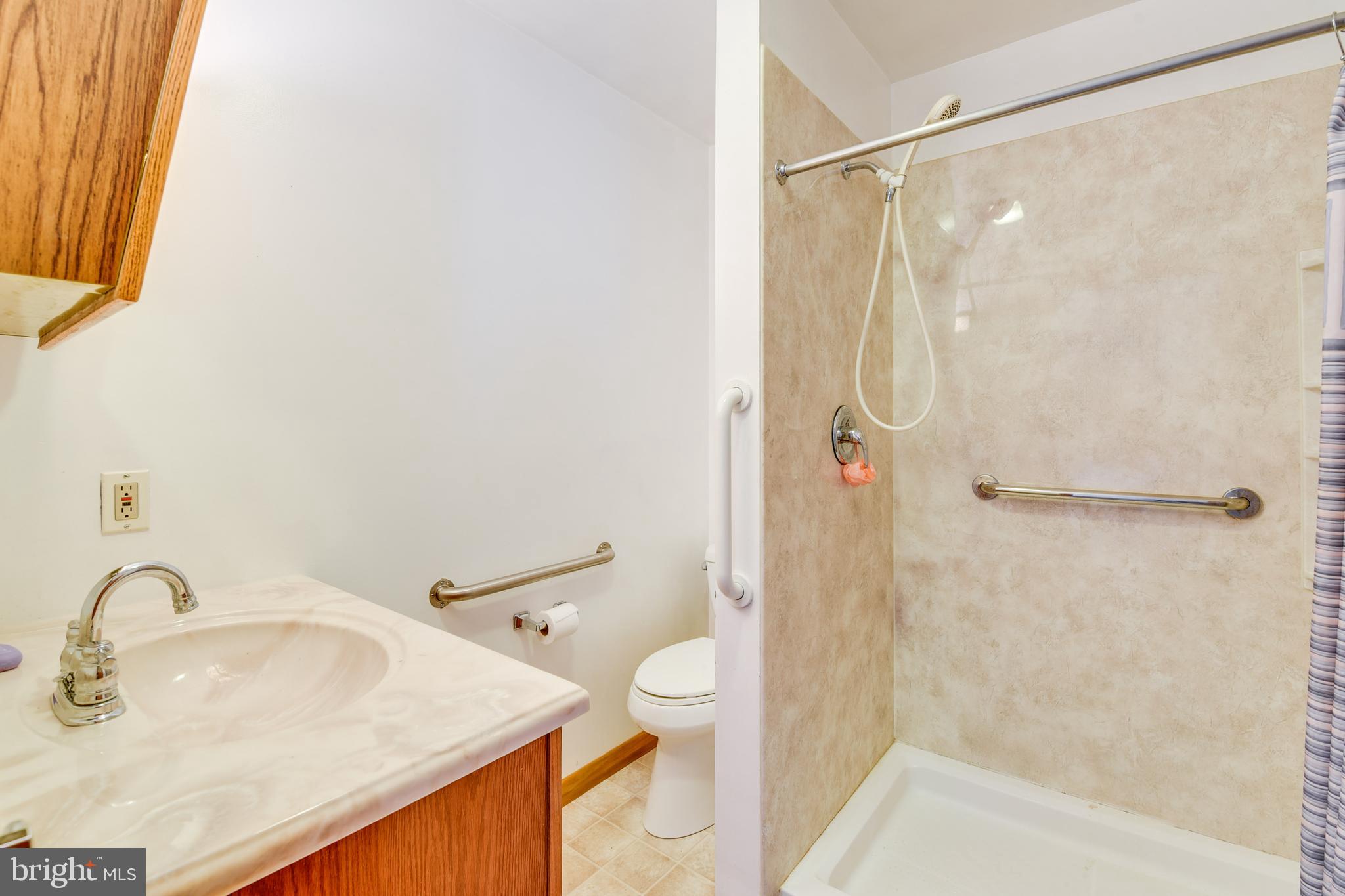 455 Community Road Severna Park, MD 21146 - Photo 30 of 51 a bathroom with a sink toilet and shower