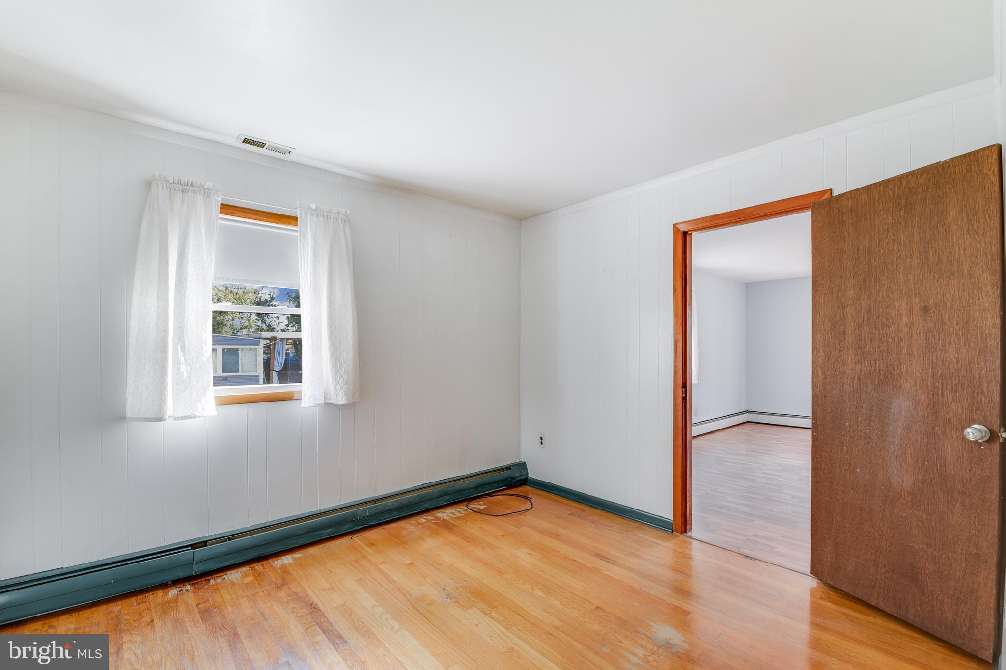 455 Community Road Severna Park, MD 21146 - Photo 32 of 51 wooden floor in an empty room