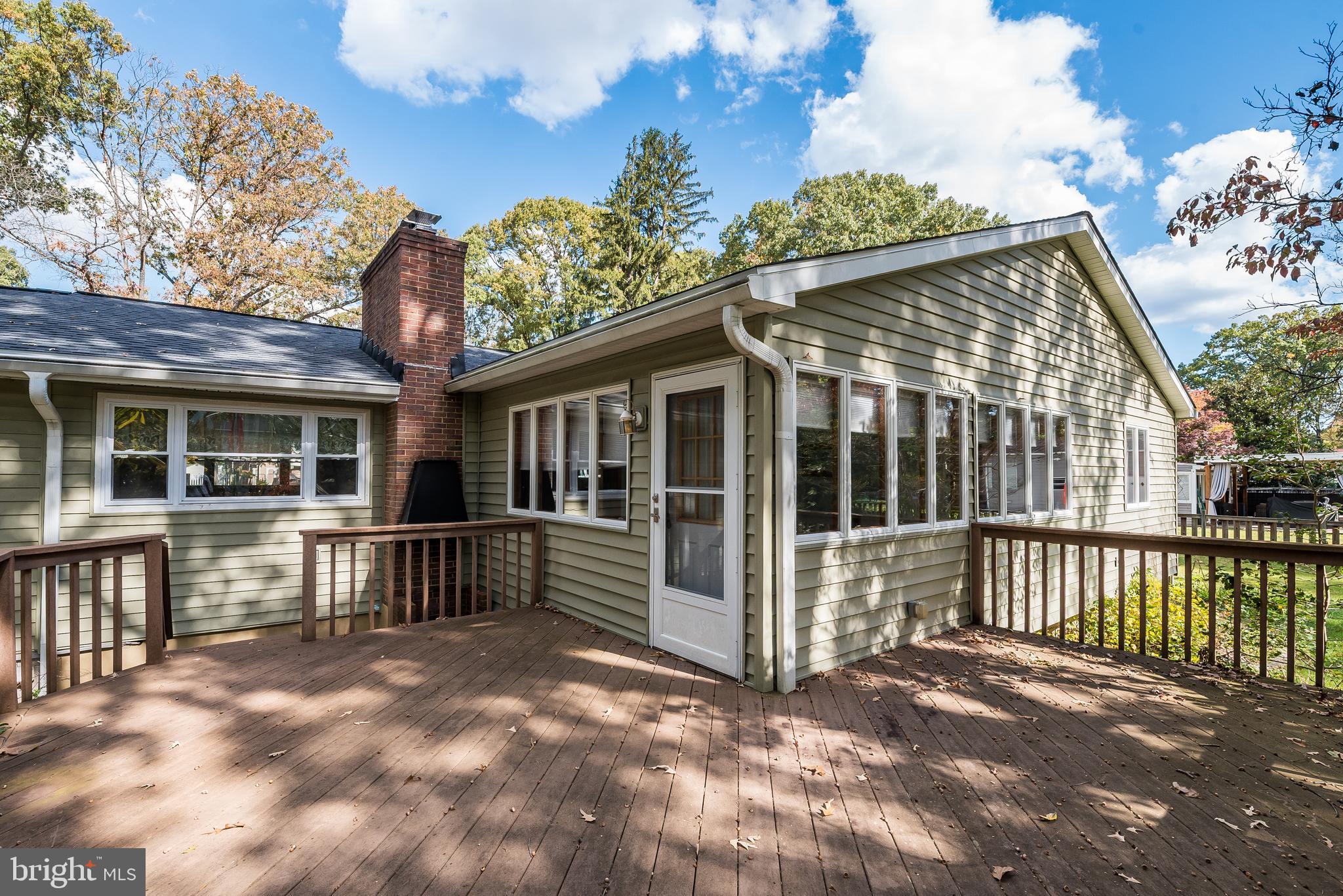 455 Community Road Severna Park, MD 21146 - Photo 46 of 51 a view of a house with a small yard and wooden fence