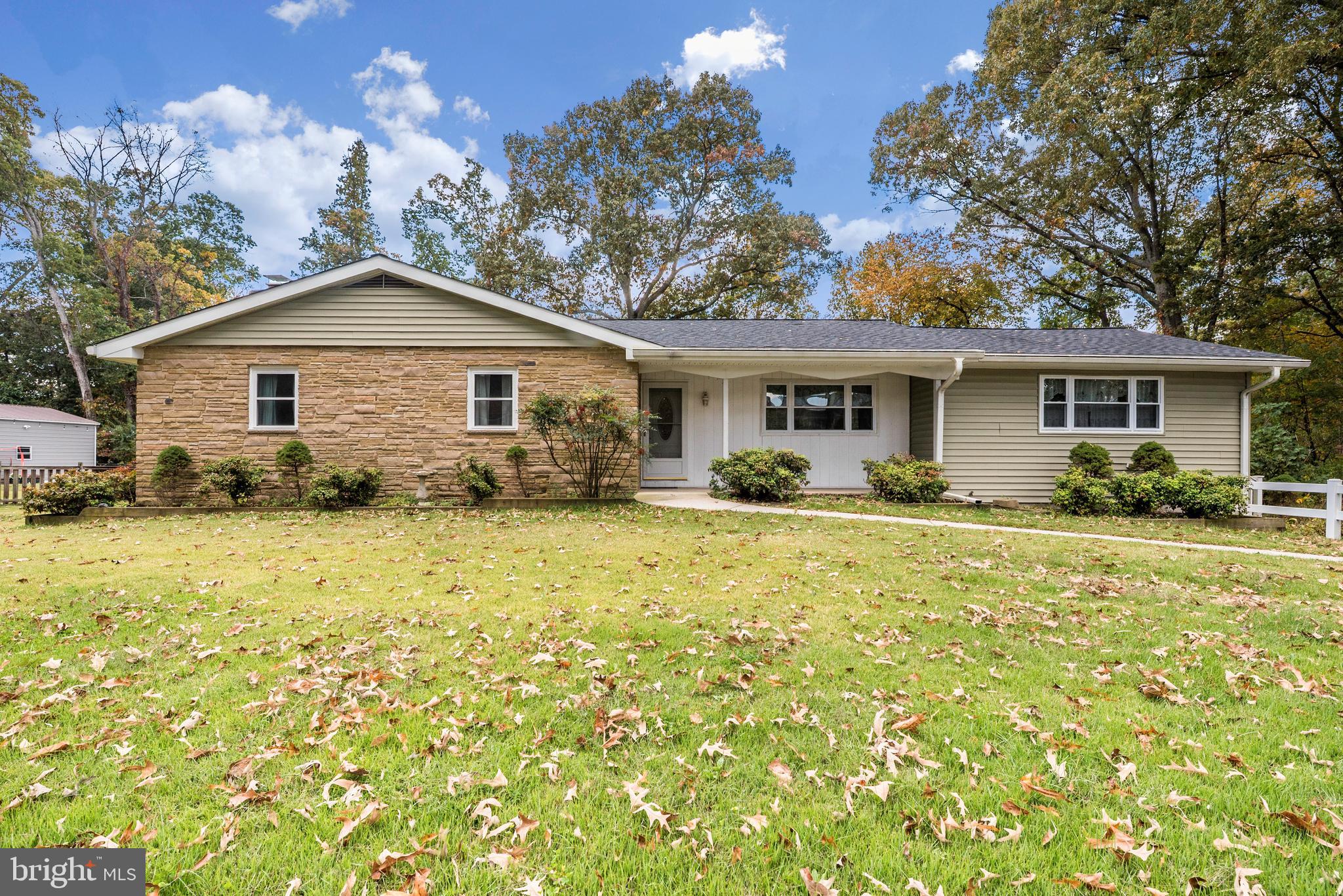 455 Community Road Severna Park, MD 21146 - Photo 5 of 51 a view of a house with a yard and potted plants