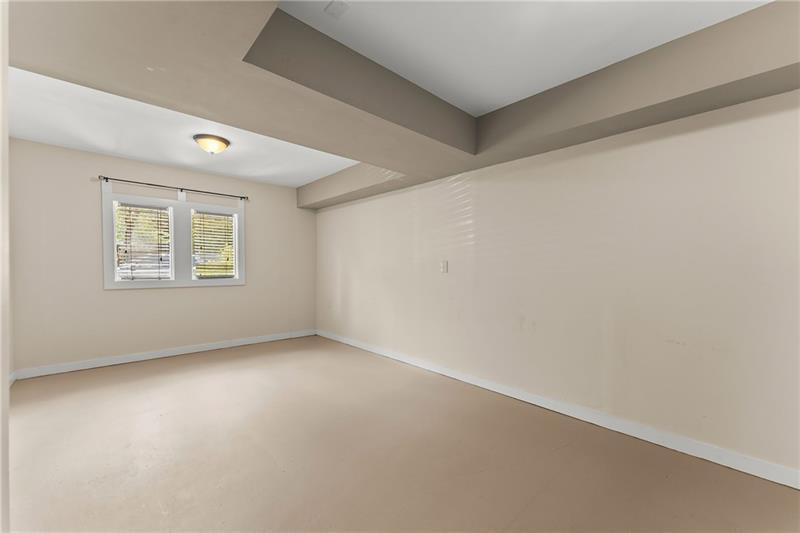 735 Calhoun Road Dahlonega, GA 30533 - Photo 33 of 53 an empty room with a window