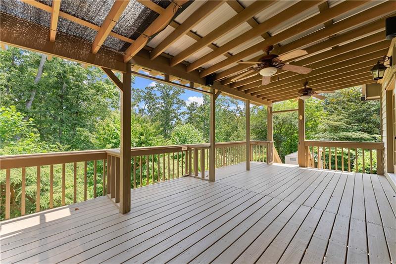 735 Calhoun Road Dahlonega, GA 30533 - Photo 37 of 53 a view of balcony with wooden floor
