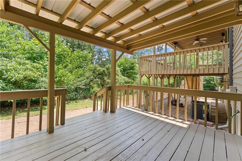 735 Calhoun Road Dahlonega, GA 30533 - Photo 38 of 53 a view of porch with wooden floor