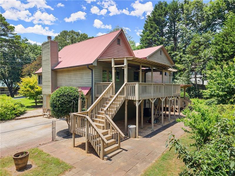 735 Calhoun Road Dahlonega, GA 30533 - Photo 46 of 53 a front view of a house with porch