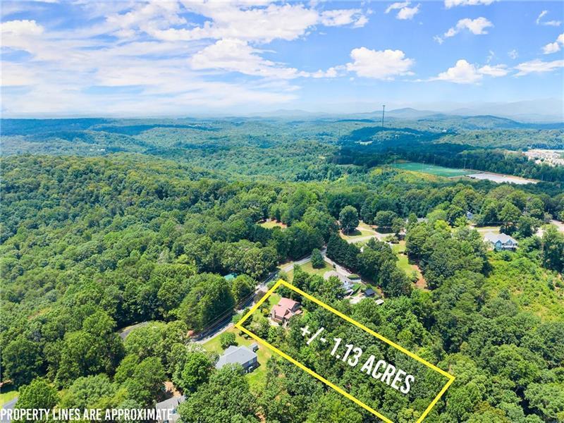 735 Calhoun Road Dahlonega, GA 30533 - Photo 48 of 53 an aerial view of a residential houses with city view