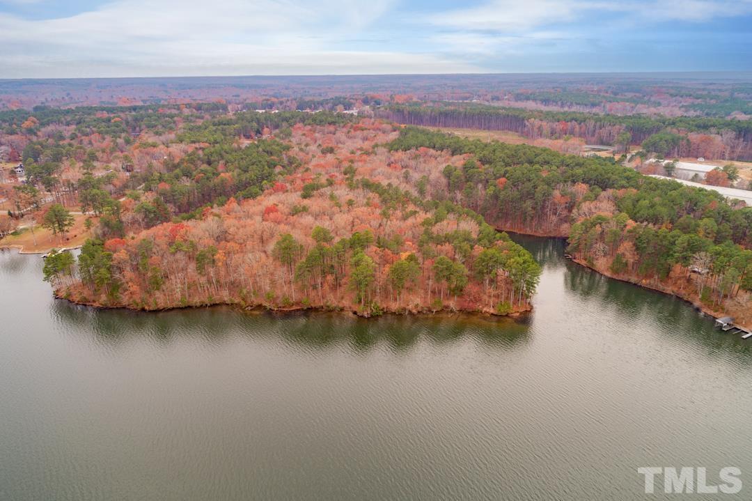 Lot 20 Serenity Point Littleton, NC 27850 - Photo 2 of 31 an aerial view of residential houses with outdoor space and lake view