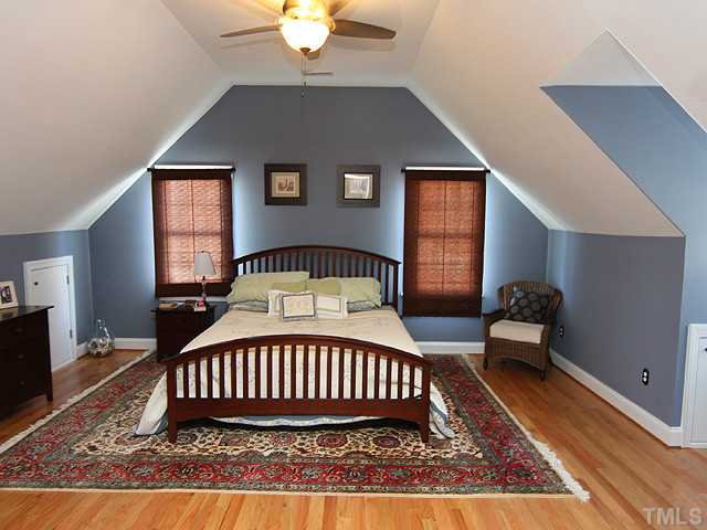2504 Scouting Trail Raleigh, NC 27615 - Photo 6 of 18 a bedroom with a bed and window