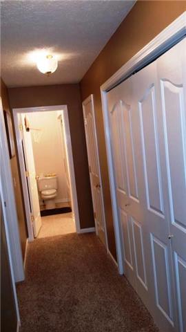 1484 Parker Road Manchester, TN 37355 - Photo 14 of 14 This is a view looking down the hall into the main bath. As you can see, there is even more closet space. A large double door closet plus a linen closet. This home offers plenty of storage.