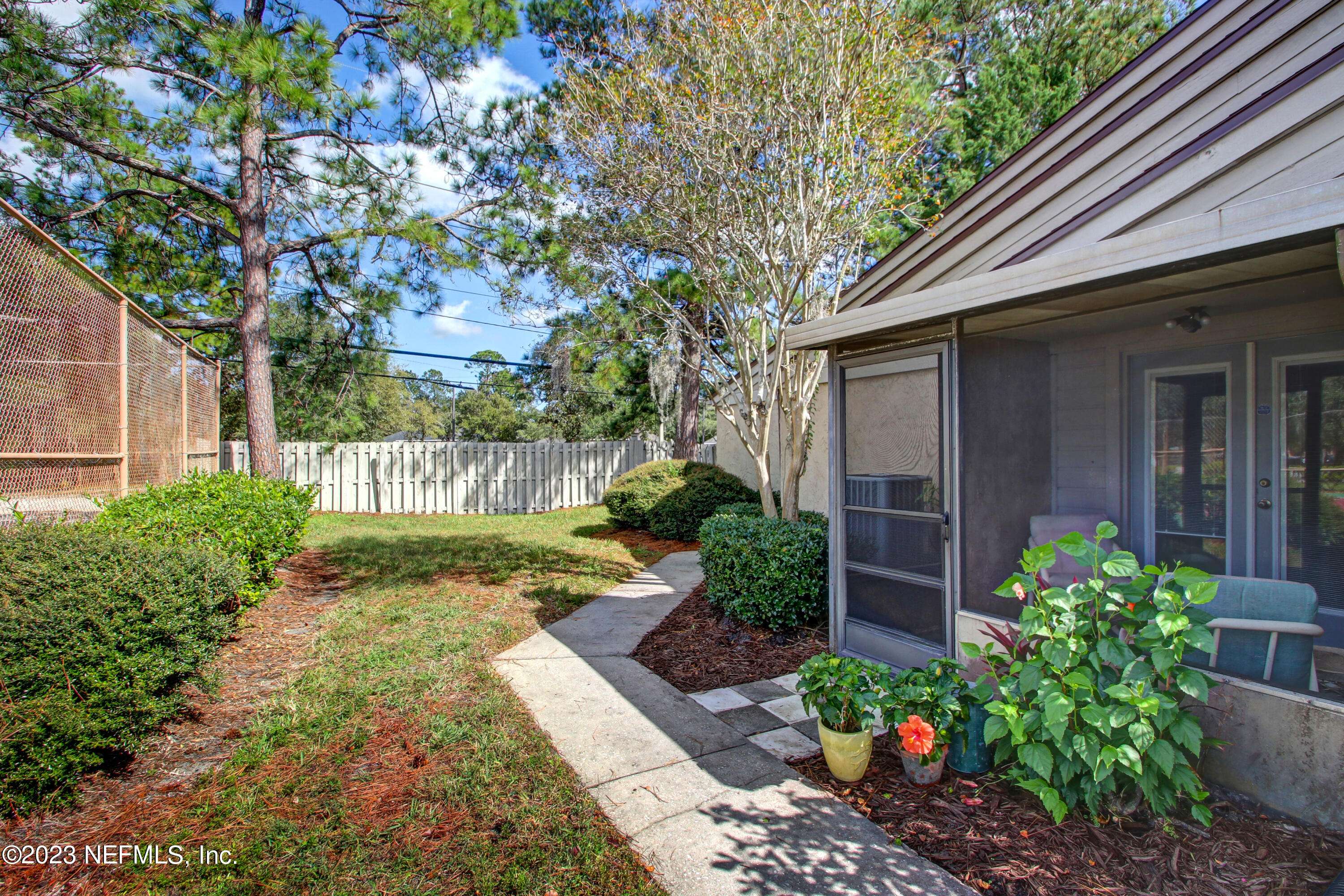 3801 Crown Point Road, Unit 3012 Jacksonville, FL 32257 - Photo 1 of 30 a view of a pathway with a house
