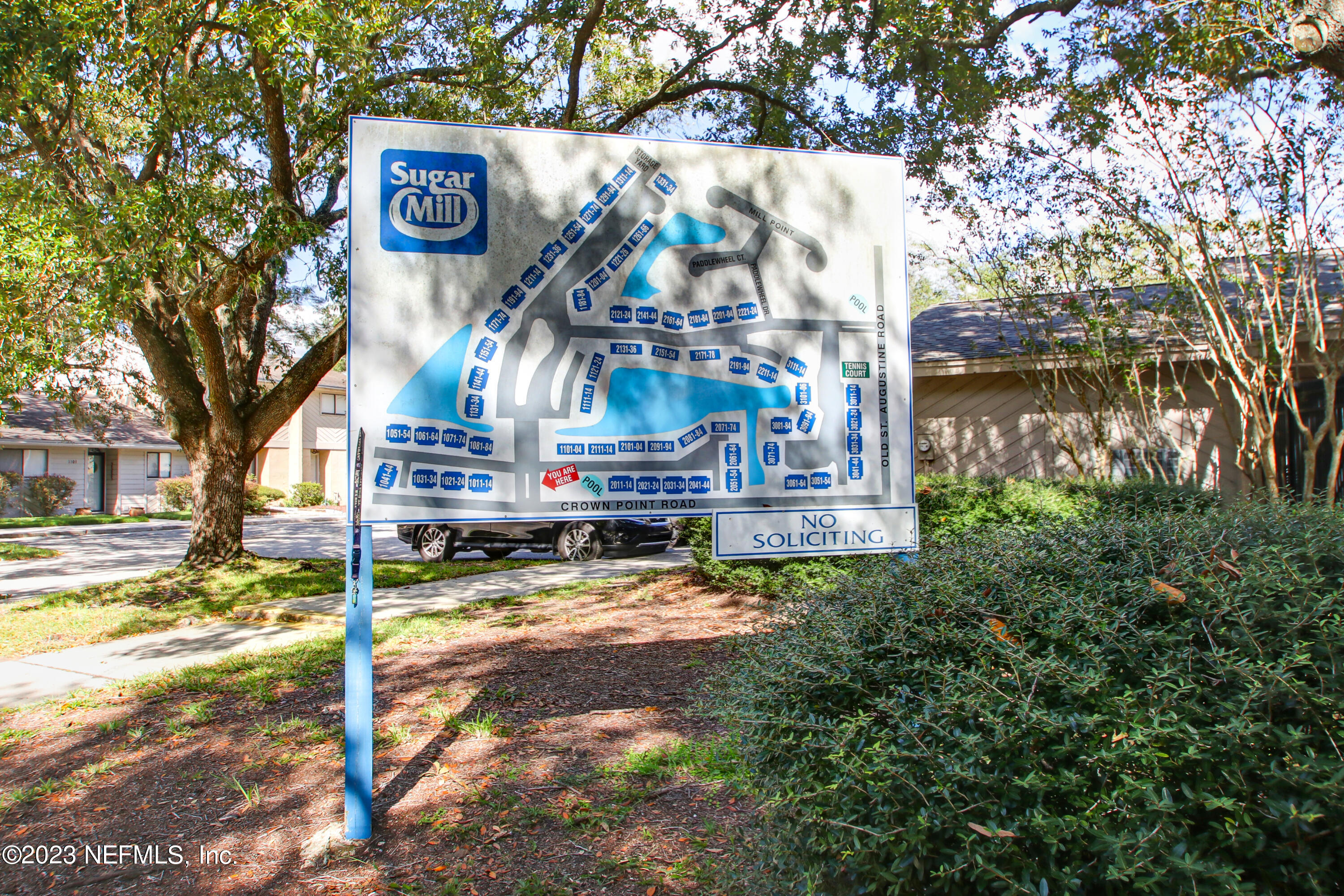 3801 Crown Point Road, Unit 3012 Jacksonville, FL 32257 - Photo 27 of 30 a sign that is on the side of a road