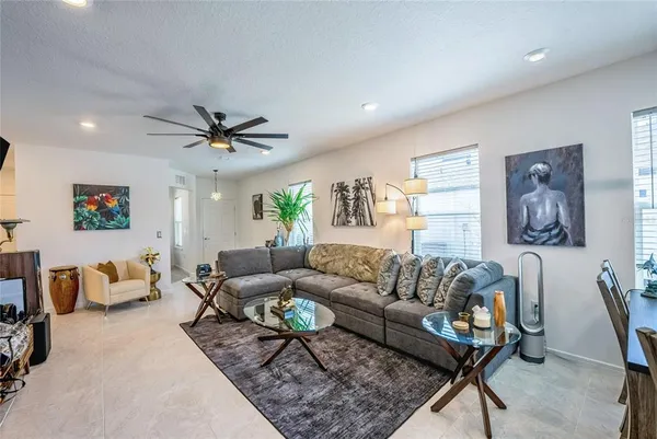 a living room with furniture and a couch