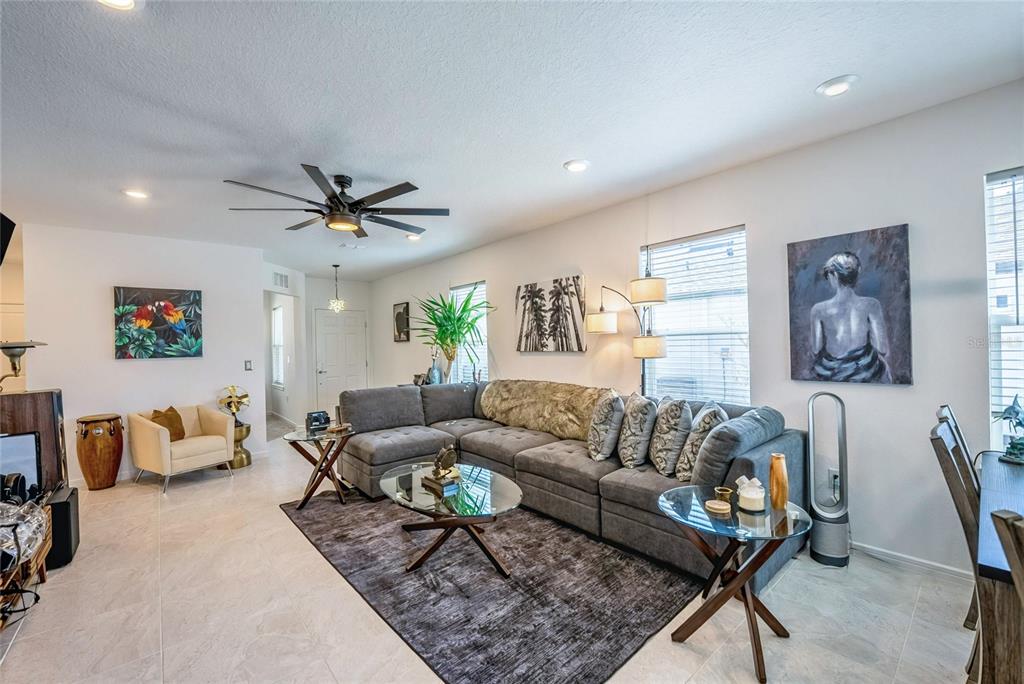 8413 Southwest 54th Street Ocala, FL 34481 - Photo 11 of 57 a living room with furniture and a couch