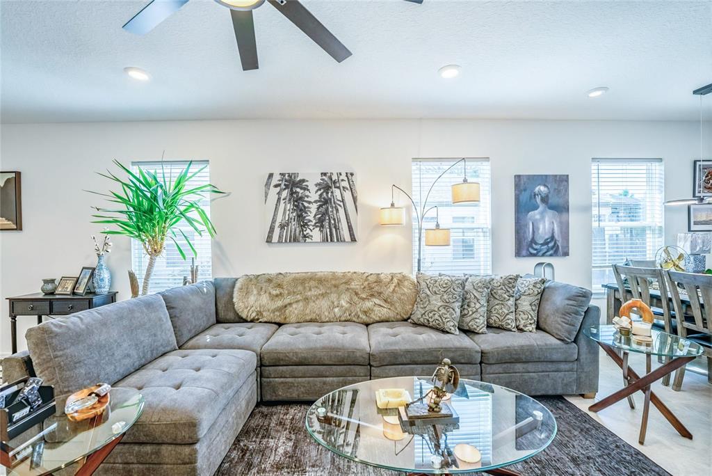 8413 Southwest 54th Street Ocala, FL 34481 - Photo 12 of 57 a living room with furniture and a couch