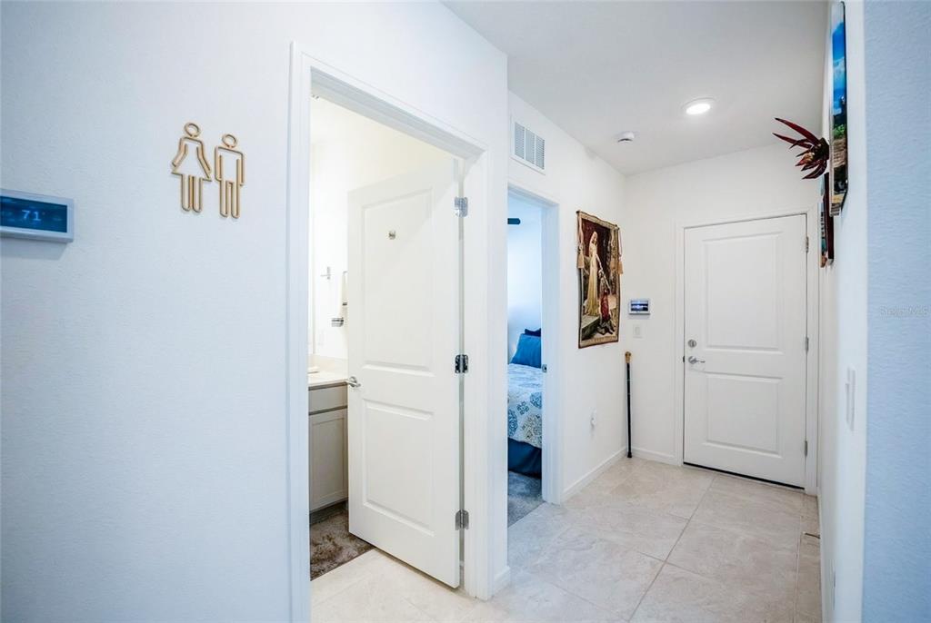 8413 Southwest 54th Street Ocala, FL 34481 - Photo 21 of 57 a view of a hallway with closet and bathroom
