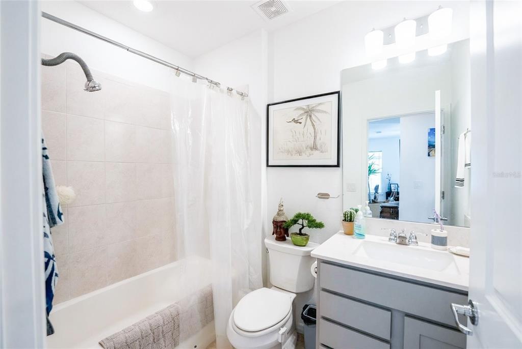 8413 Southwest 54th Street Ocala, FL 34481 - Photo 22 of 57 a bathroom with a sink toilet and shower
