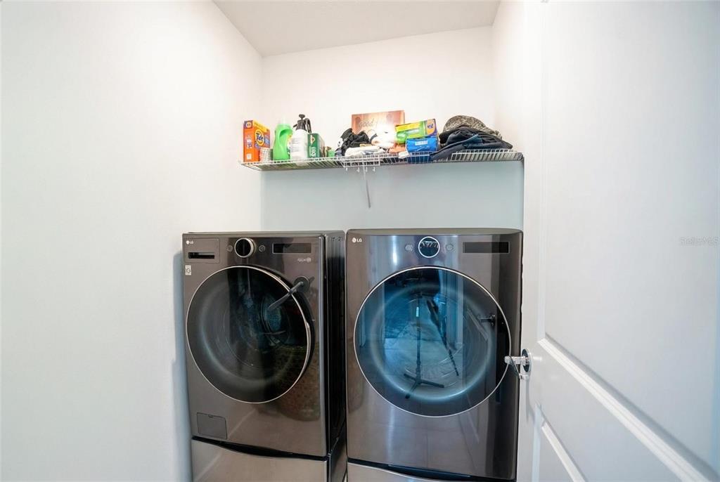 8413 Southwest 54th Street Ocala, FL 34481 - Photo 26 of 57 a utility room with dryer and washer