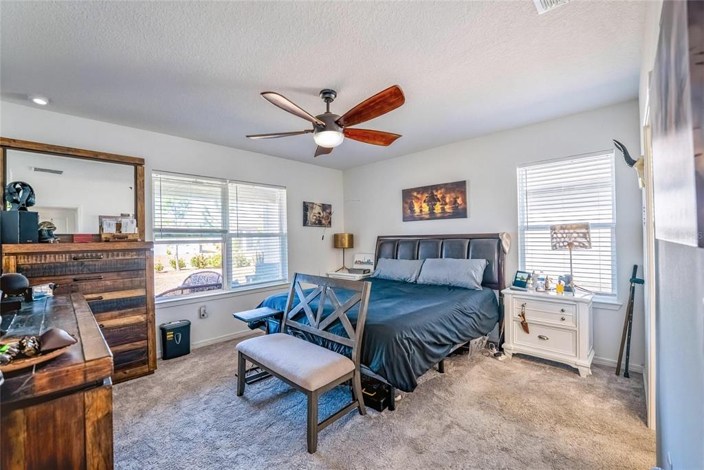 8413 Southwest 54th Street Ocala, FL 34481 - Photo 27 of 57 a living room with furniture and a large window