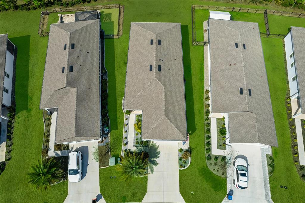 8413 Southwest 54th Street Ocala, FL 34481 - Photo 36 of 57 an aerial view of a house with outdoor space and a swimming pool