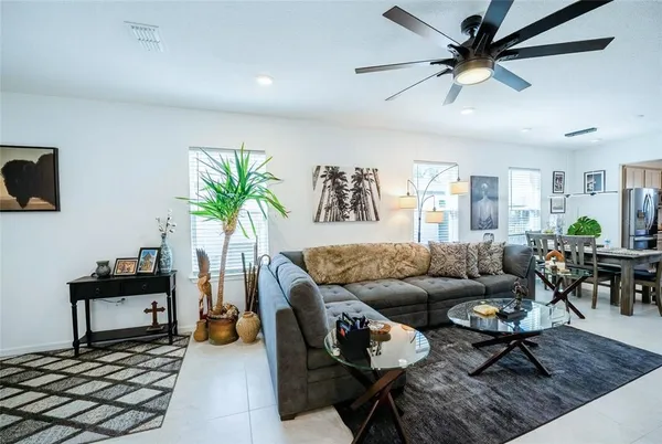 a living room with furniture and a table