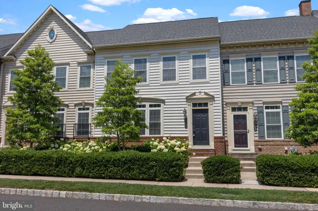 a front view of house with a yard