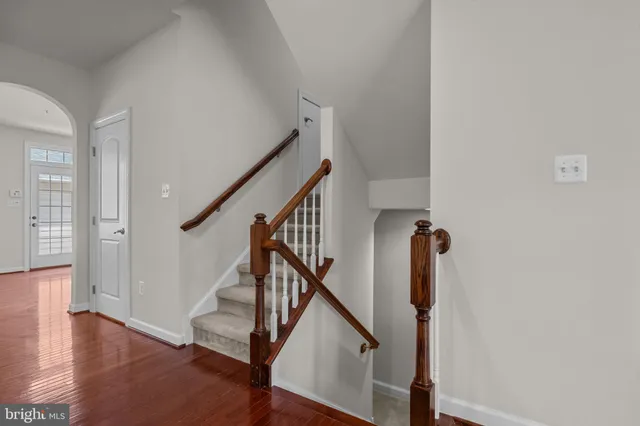 a view of entryway with wooden floor