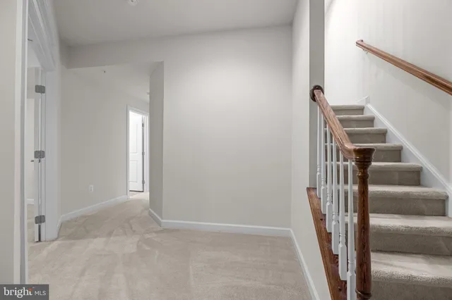 a view of an entryway with staircase