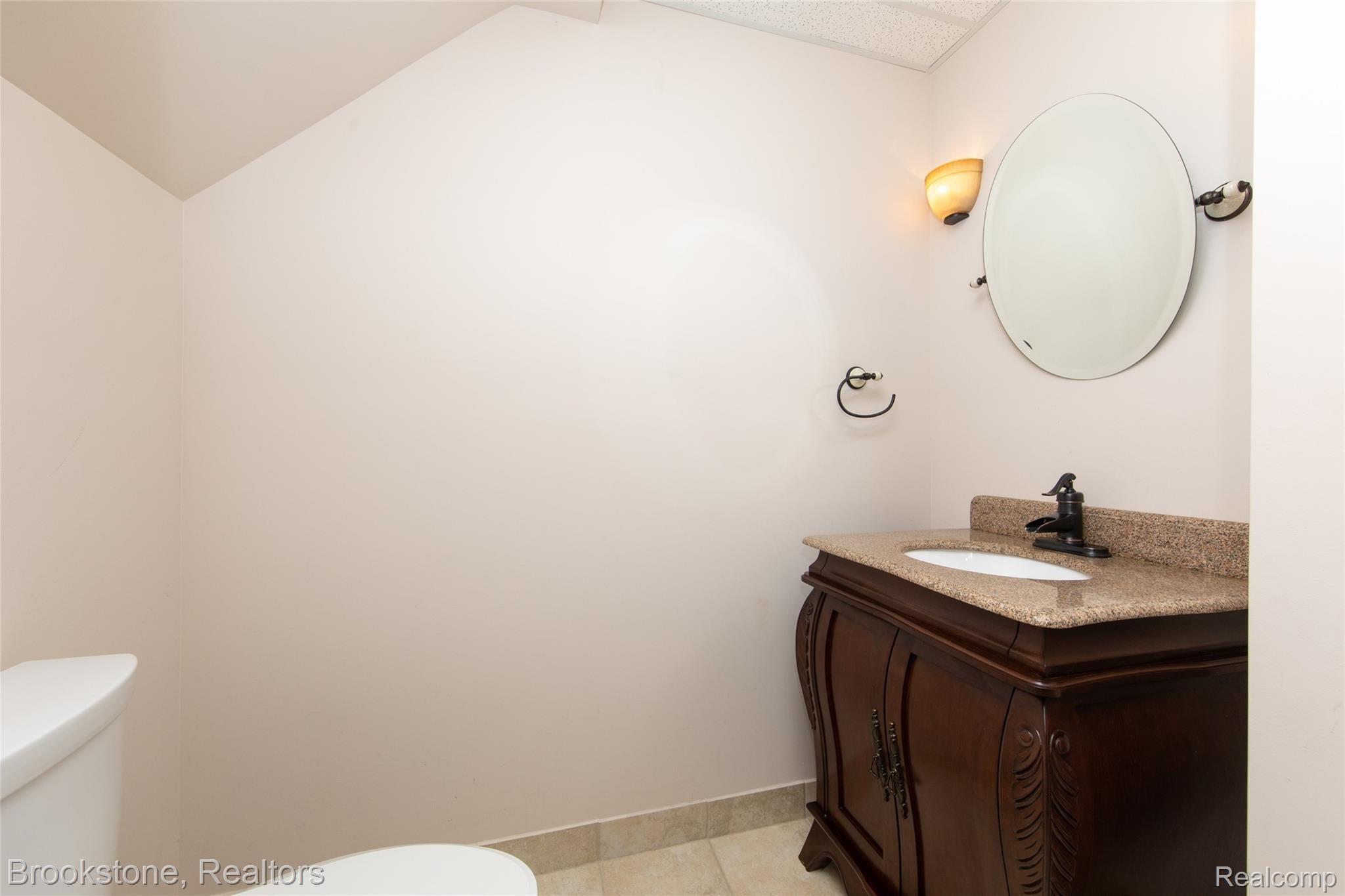 937 Ten Point Drive Rochester, MI 48309 - Photo 38 of 40 Convenient Half Bath in LL