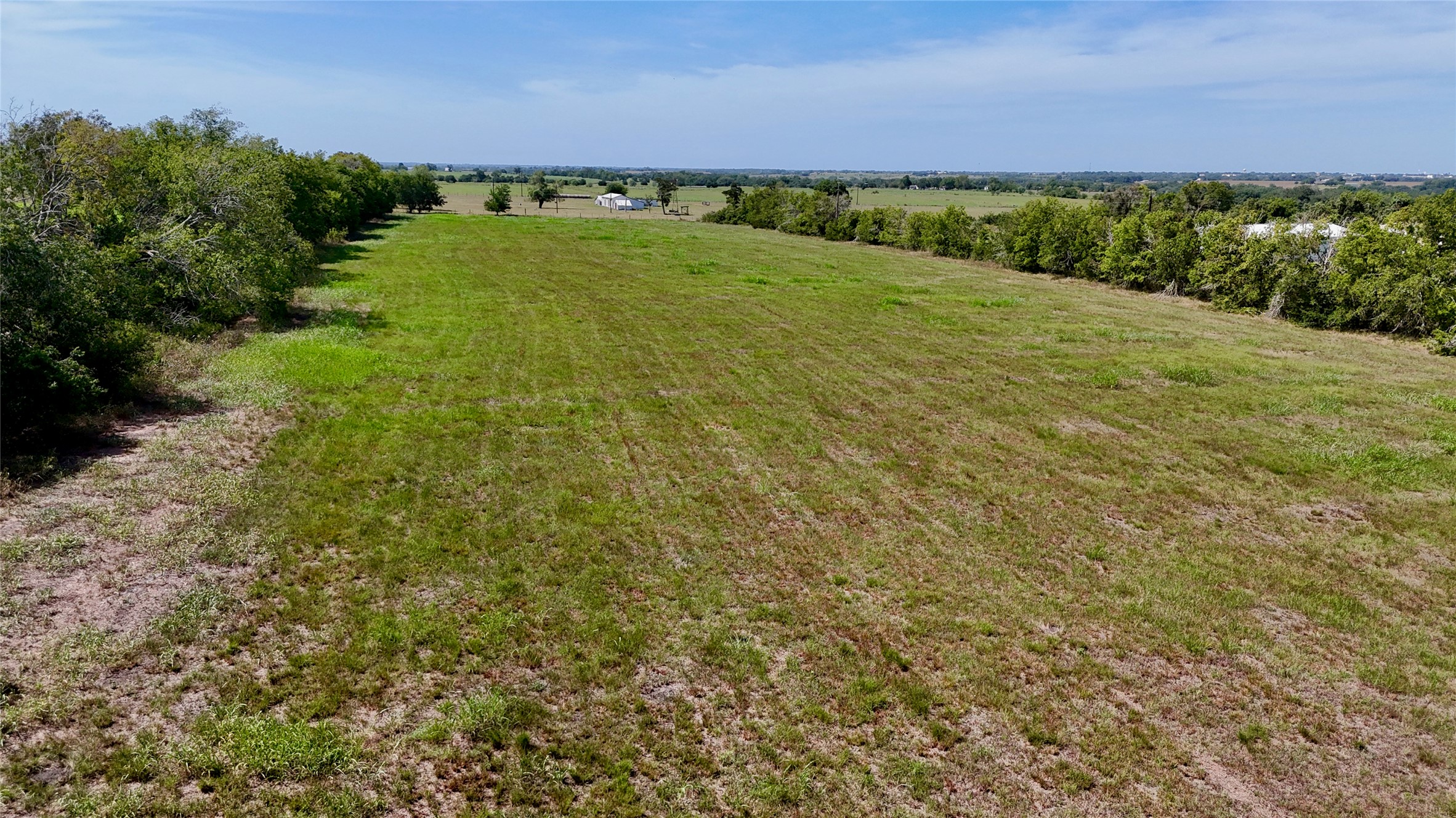 5 Company Field Road Schulenburg, TX 78956 - Photo 8 of 17 a view of a field with an ocean