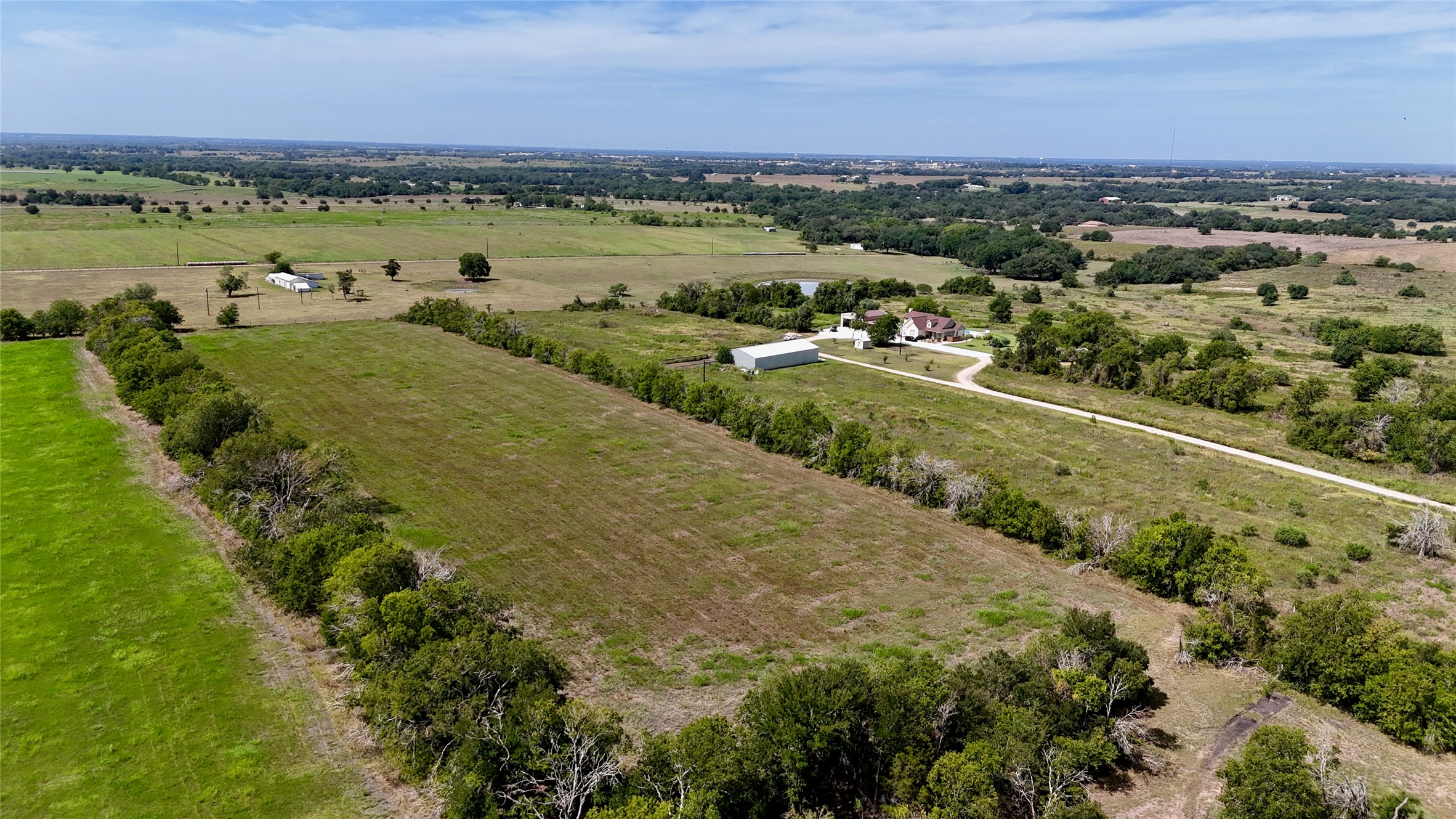 5 Company Field Road Schulenburg, TX 78956 - Photo 9 of 17 a view of a city with mountains in the background